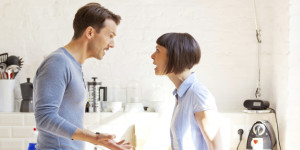 Couple having a discussion in the kitchen