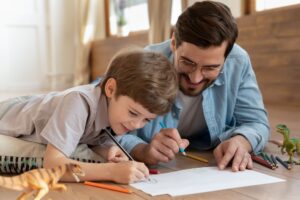 dad with child coloring
